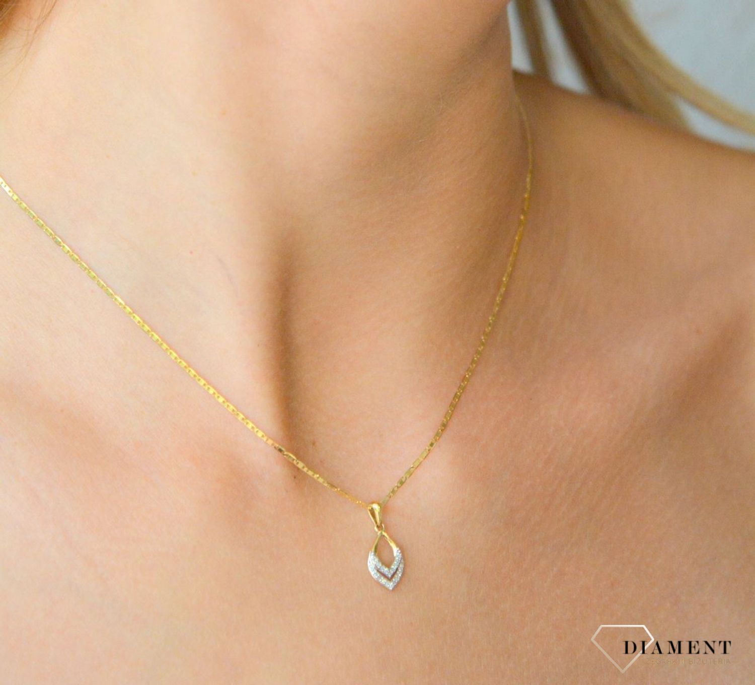 Złota zawieszka 585 z diamentem HSI 0,05ct22. Złota zawieszka 585 z diamentem to idealny pomysł na prezent dla ukochanej kobiety (1).JPG